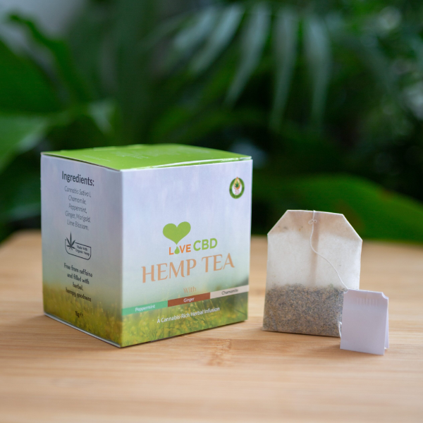 Love CBD Hemp Tea Bags on wooden table