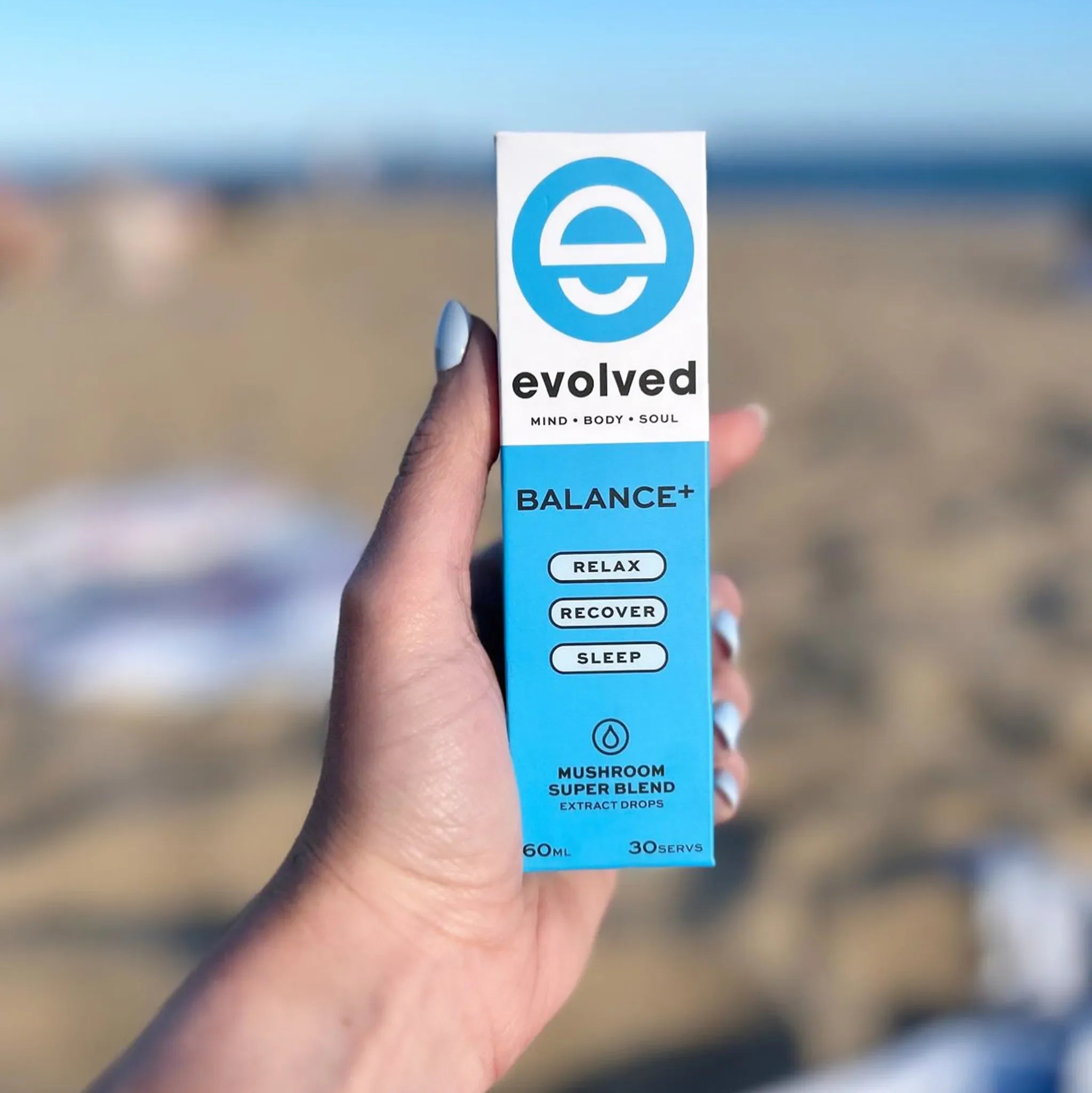 Evolved Tinnitus Calm Mushroom Extract - beach photo shot